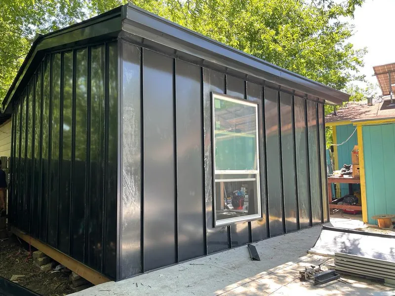 Black standing seam metal wall panels for Roof Inspection in Waller